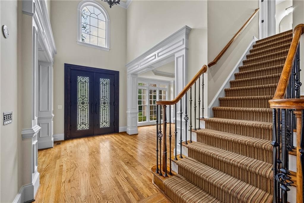 6 bedroom, 5 bathroom, 5,780 sq ft single family residence for sale at 5545 Stoneleigh Drive, Suwanee, GA 30024 — photo 4