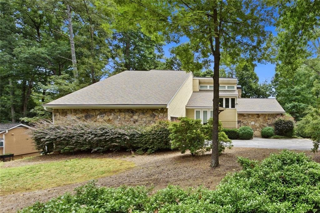 4 bedroom, 4 bathroom, 4,010 sq ft single family residence for sale at 2990 Ascot Lane, Roswell, GA 30076