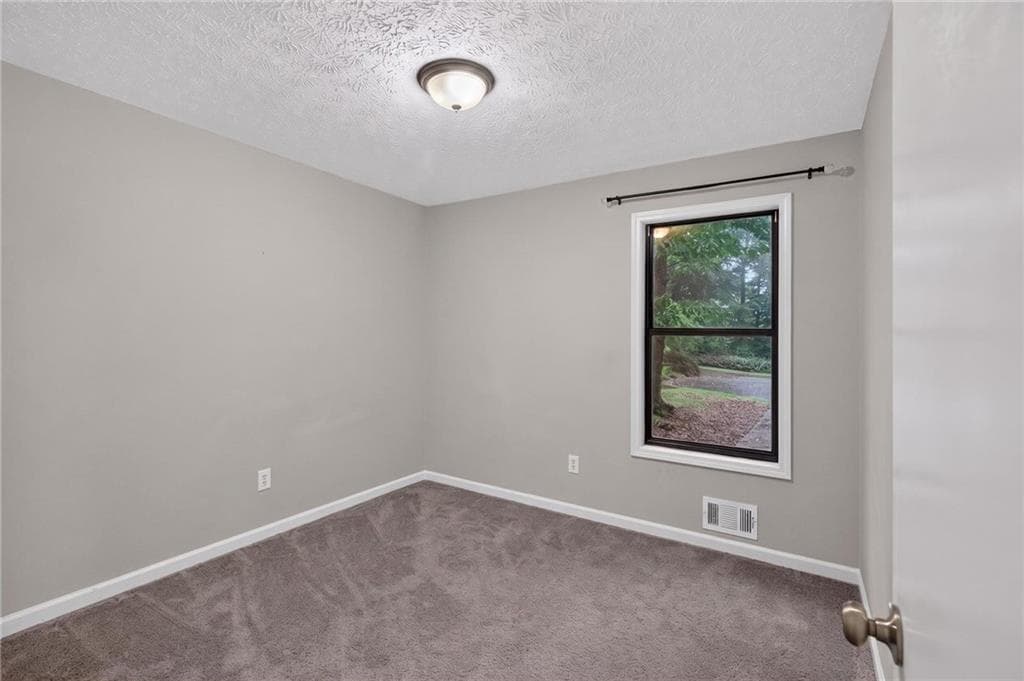 3 bedroom, 2 bathroom, 1,221 sq ft single family residence for sale at 4325 Woodland Drive, Dallas, GA 30132 — photo 6