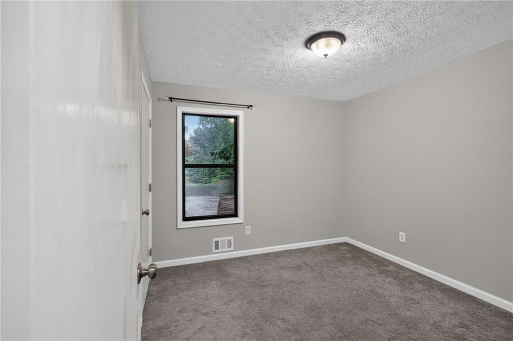 3 bedroom, 2 bathroom, 1,221 sq ft single family residence for sale at 4325 Woodland Drive, Dallas, GA 30132 — photo 8