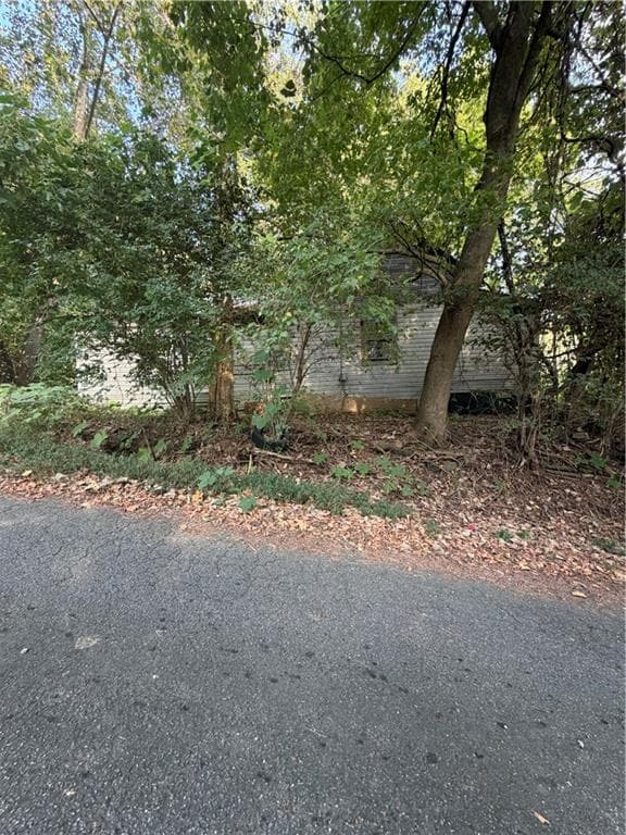 2 bedroom, 1 bathroom, 1,100 sq ft single family residence under contract at 128 Pulltight Road, Marble Hill, GA 30148 — photo 2