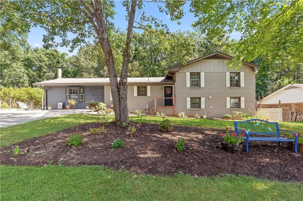 3 bedroom, 3 bathroom, 2,061 sq ft single family residence for sale at 3008 Carrie Drive, Kennesaw, GA 30144 — photo 1 of 32