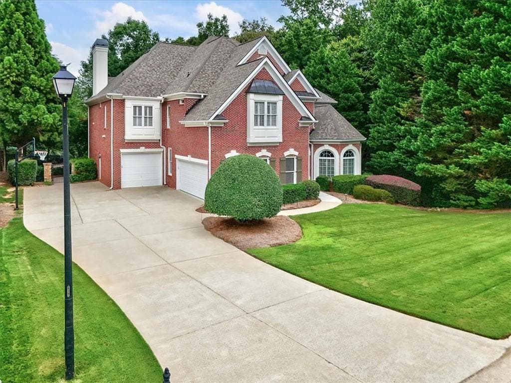5 bedroom, 6 bathroom, 7,185 sq ft single family residence for sale at 8615 Moor Park Run, Duluth, GA 30097 — photo 3