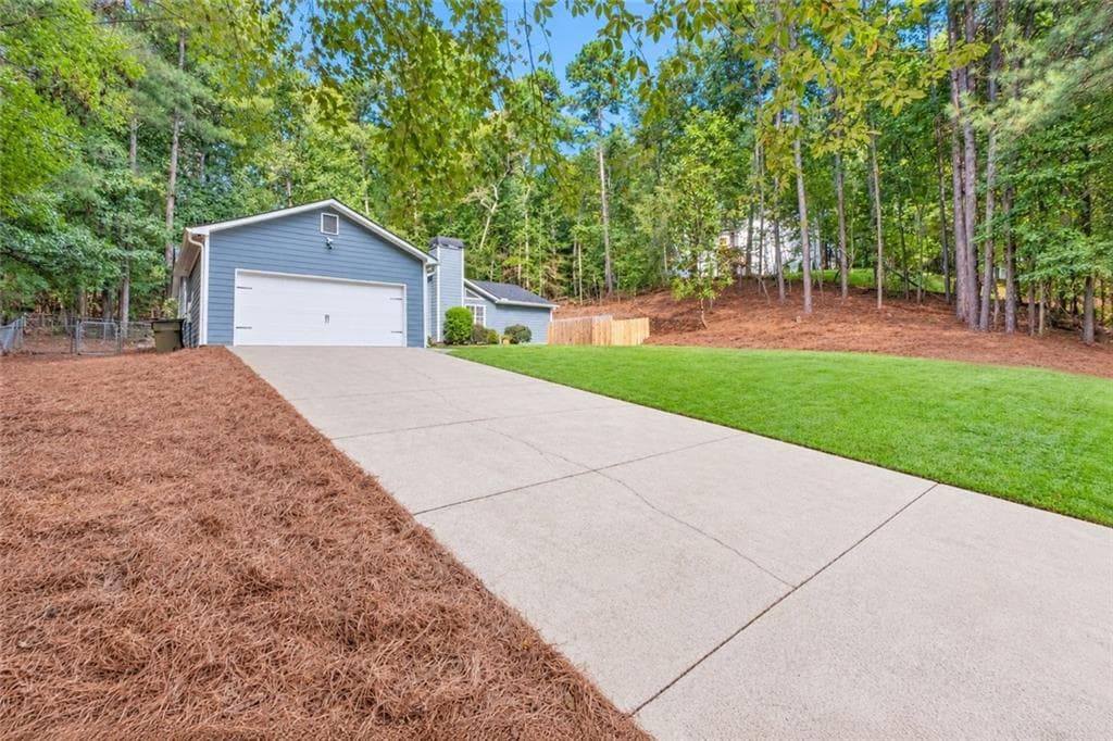 3 bedroom, 2 bathroom, 1,752 sq ft single family residence for sale at 3900 Maple Wood Trail, Buford, GA 30518 — photo 5