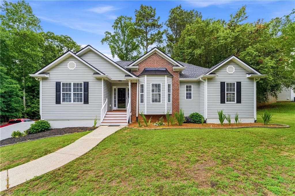 4 bedroom, 3 bathroom, 2,403 sq ft single family residence for sale at 4036 Saint George Walk, Powder Springs, GA 30127 — photo 2