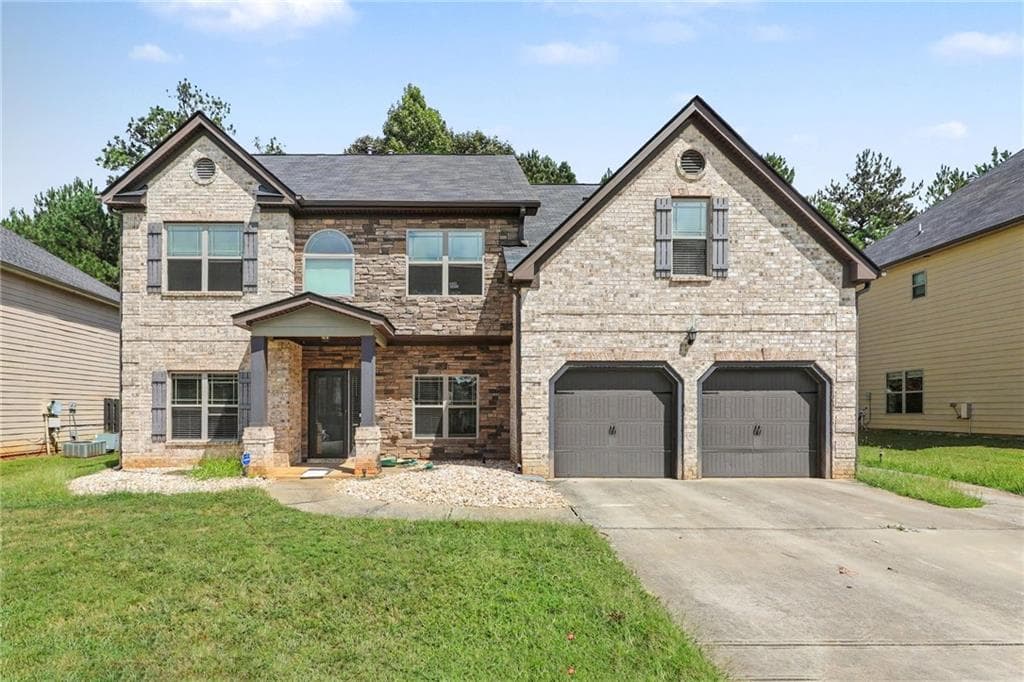 5 bedroom, 4 bathroom, 3,198 sq ft single family residence for sale at 646 Toronto Circle, Hampton, GA 30228