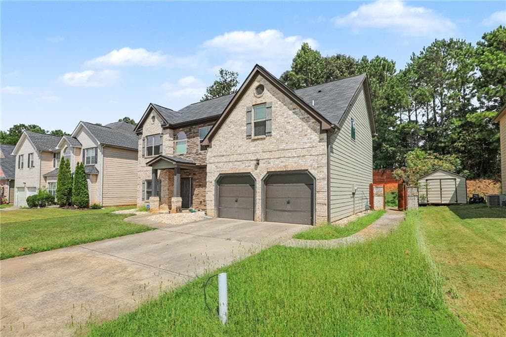 5 bedroom, 4 bathroom, 3,198 sq ft single family residence for sale at 646 Toronto Circle, Hampton, GA 30228 — photo 7