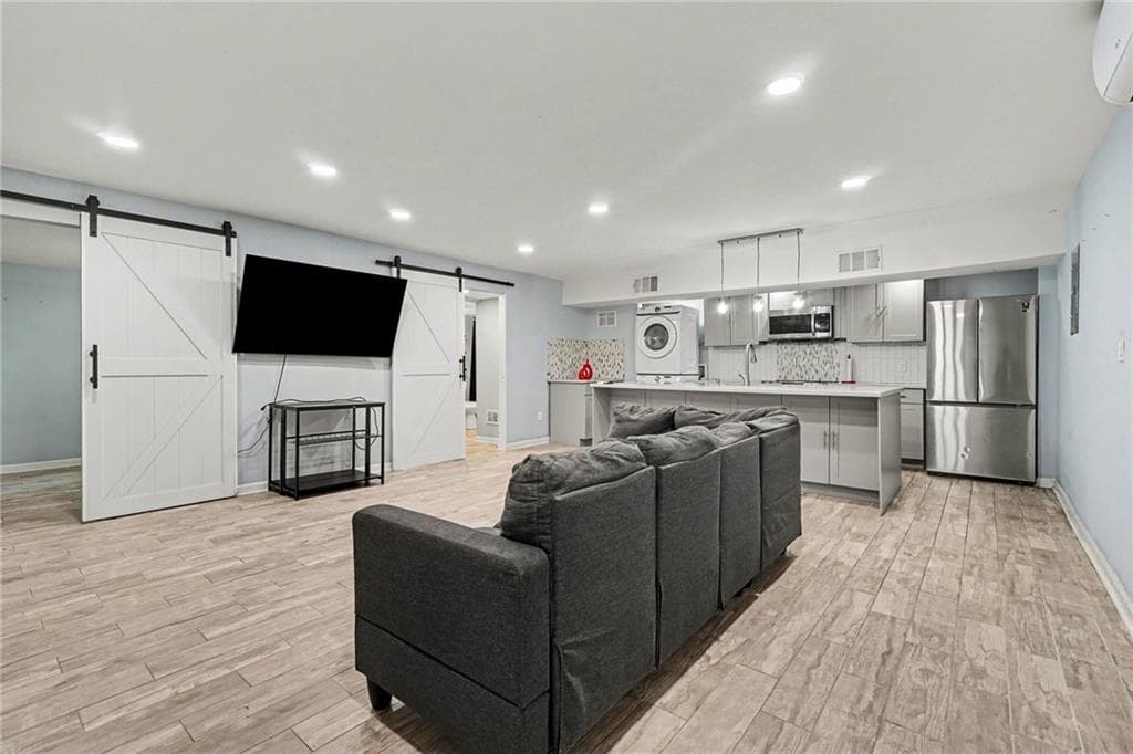 4 bedroom, 3 bathroom, 2,084 sq ft single family residence for sale at 2726 Raven Wood Drive, Snellville, GA 30078 — photo 4