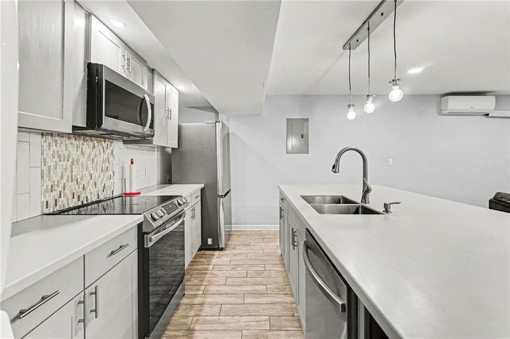 4 bedroom, 3 bathroom, 2,084 sq ft single family residence for sale at 2726 Raven Wood Drive, Snellville, GA 30078 — photo 5