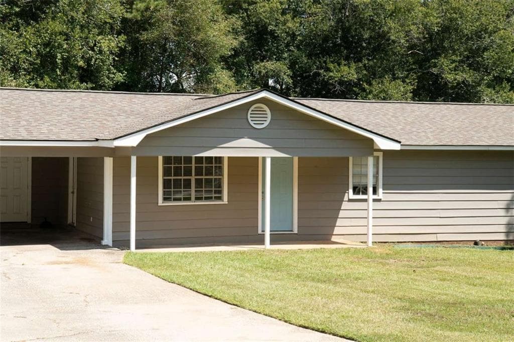 3 bedroom, 2 bathroom, 1,232 sq ft single family residence for sale at 20 Woodland Drive, Carrollton, GA 30117 — photo 2