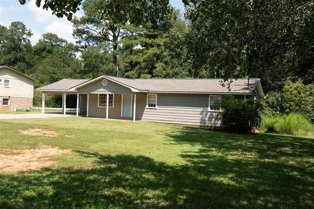 3 bedroom, 2 bathroom, 1,232 sq ft single family residence for sale at 20 Woodland Drive, Carrollton, GA 30117 — photo 5
