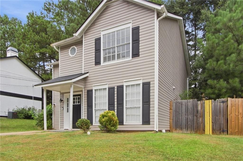 5 bedroom, 3 bathroom, 1,516 sq ft single family residence for sale at 5535 Downs Way, Lithonia, GA 30058 — photo 3
