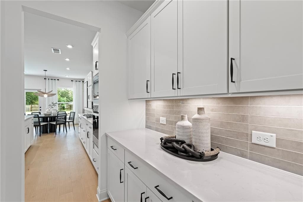 5 bedroom, 4 bathroom, 3,050 sq ft single family residence for sale at 244 Rockledge Bend, Powder Springs, GA 30127 — photo 8