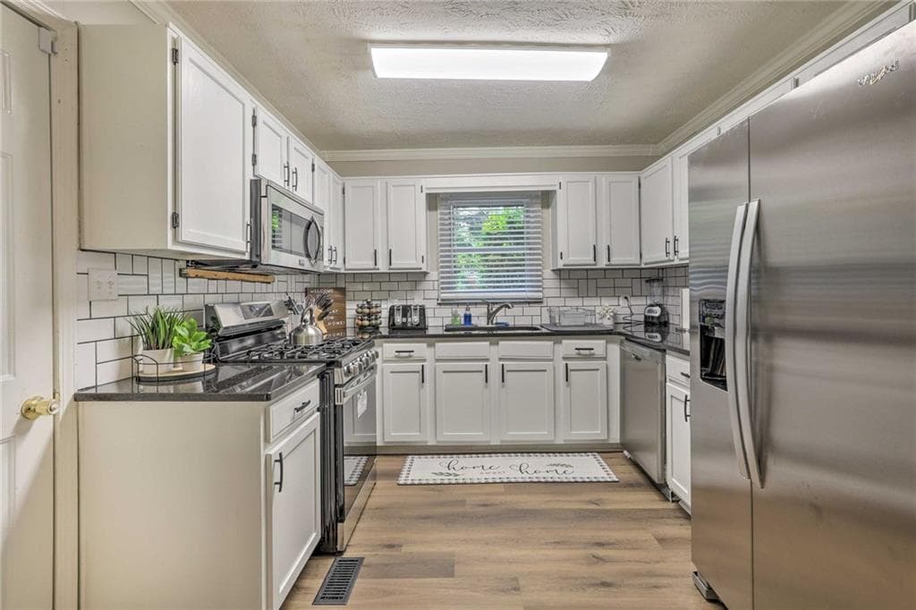 3 bedroom, 2 bathroom, 1,399 sq ft single family residence for sale at 2671 Collier Drive, Atlanta, GA 30318 — photo 10