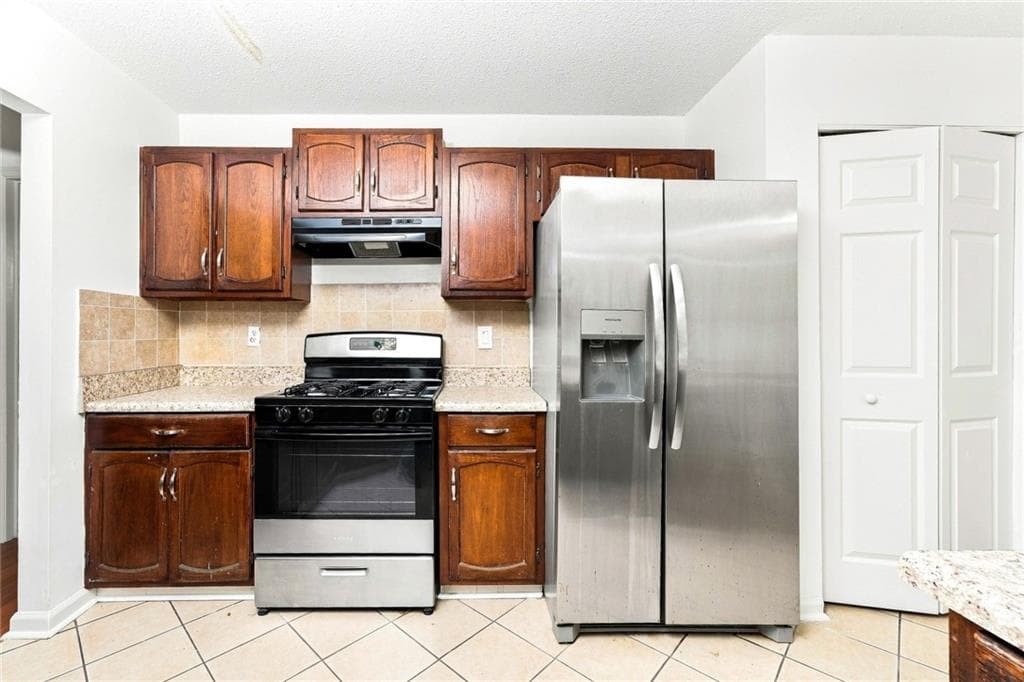 3 bedroom, 2 bathroom, 1,621 sq ft single family residence for rent at 3061 Herscu Way, Lithonia, GA 30038 for $1,710 a month — photo 2