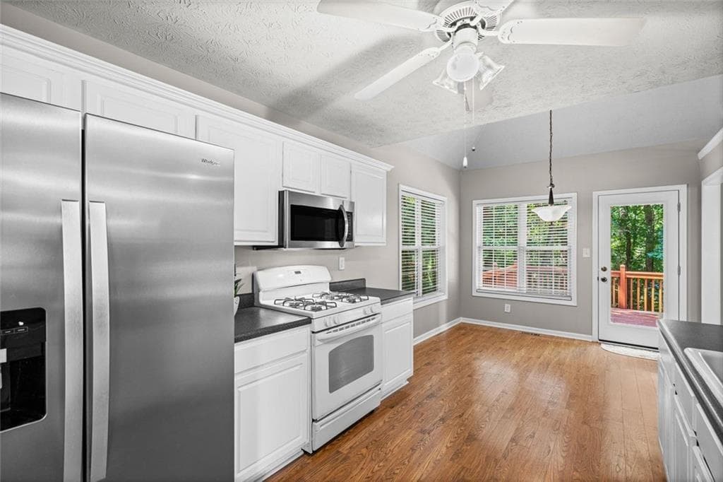 4 bedroom, 3 bathroom, 2,628 sq ft single family residence for sale at 6225 Brook Hollow Creek Drive, Cumming, GA 30028 — photo 2