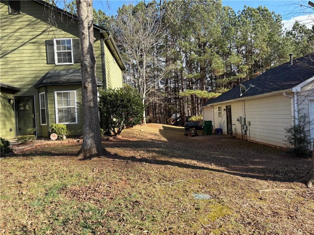 3 bedroom, 2 bathroom, 1,527 sq ft single family residence for sale at 4608 Latchwood Drive, Lithonia, GA 30038 — photo 3