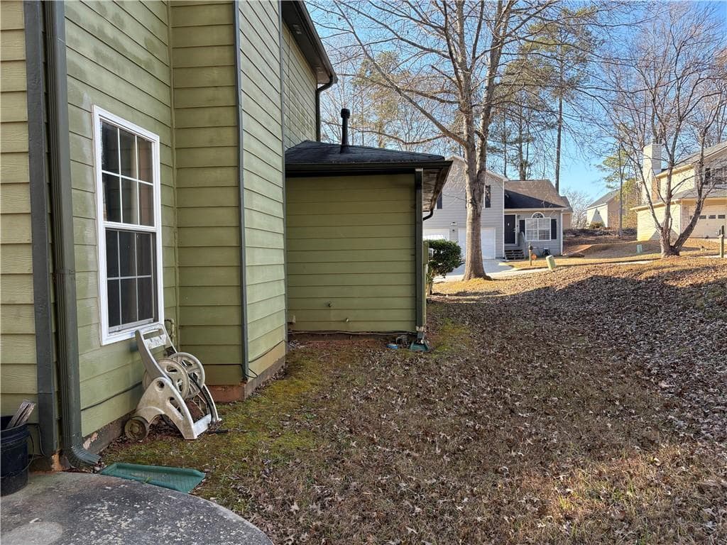 3 bedroom, 2 bathroom, 1,527 sq ft single family residence for sale at 4608 Latchwood Drive, Lithonia, GA 30038 — photo 4