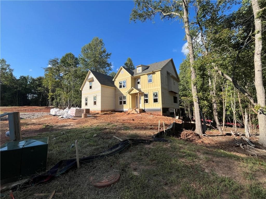 5 bedroom, 4 bathroom, 3,590 sq ft single family residence for sale at 6135 Peaceful Grove (Lot 48) Drive, Cumming, GA 30041 — photo 2