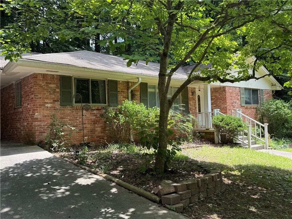 3 bedroom, 2 bathroom, 1,226 sq ft single family residence for rent at 1057 Latham Road, Decatur, GA 30033 for $2,200 a month — photo 1 of 9
