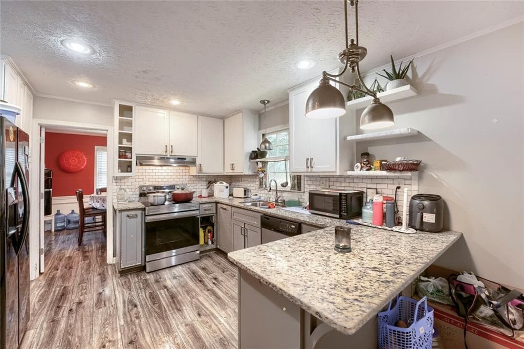 4 bedroom, 3 bathroom, 2,002 sq ft single family residence for sale at 2558 Kings Way, Lawrenceville, GA 30044 — photo 5