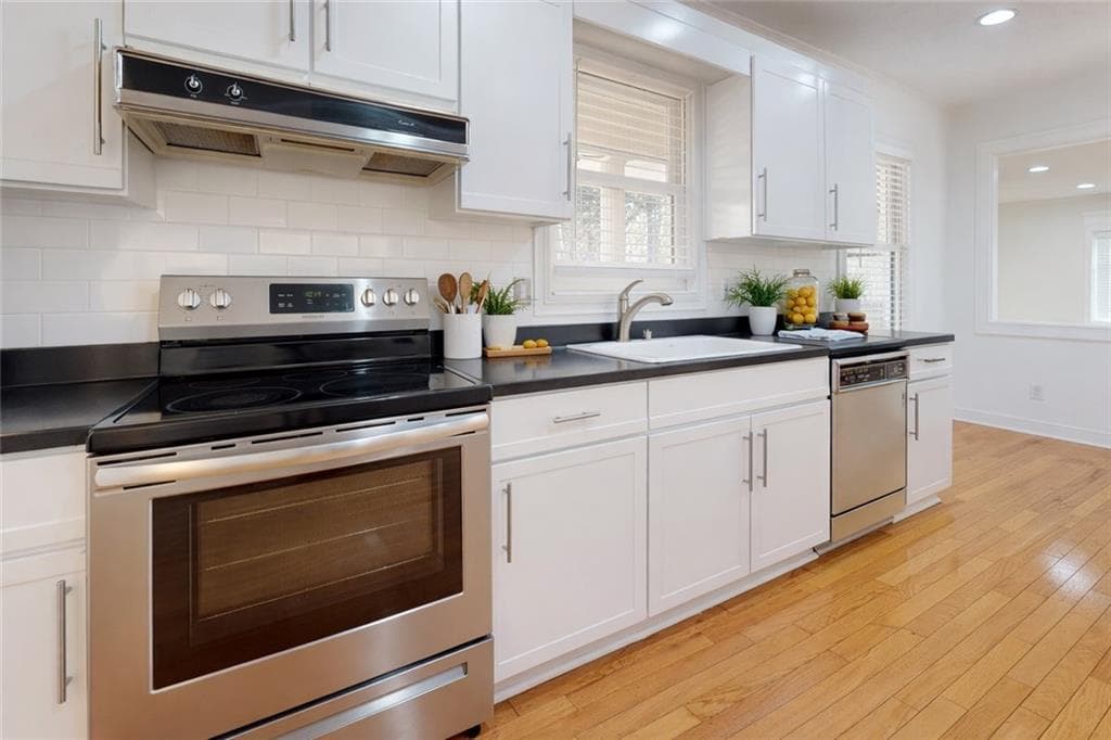 4 bedroom, 3 bathroom, 3,865 sq ft single family residence for sale at 1319 Janmar Road, Snellville, GA 30078 — photo 4