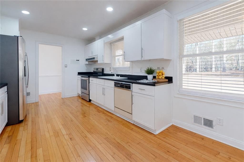 4 bedroom, 3 bathroom, 3,865 sq ft single family residence for sale at 1319 Janmar Road, Snellville, GA 30078 — photo 5