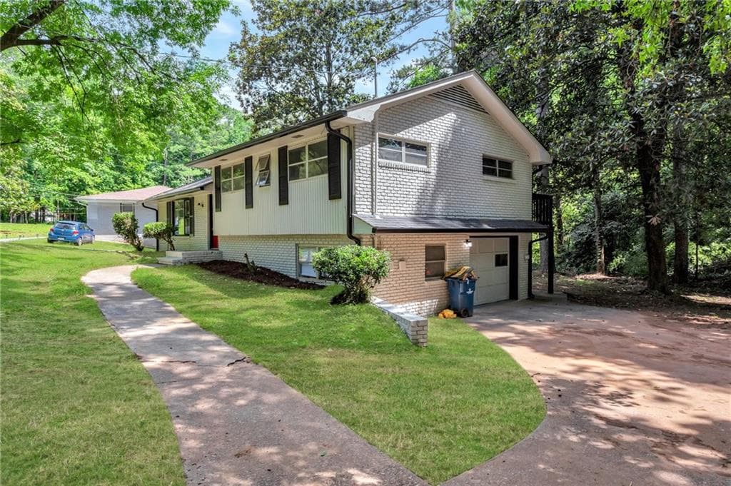 3 bedroom, 2 bathroom, 1,276 sq ft single family residence for sale at 4139 Janice Drive, College Park, GA 30337 — photo 2