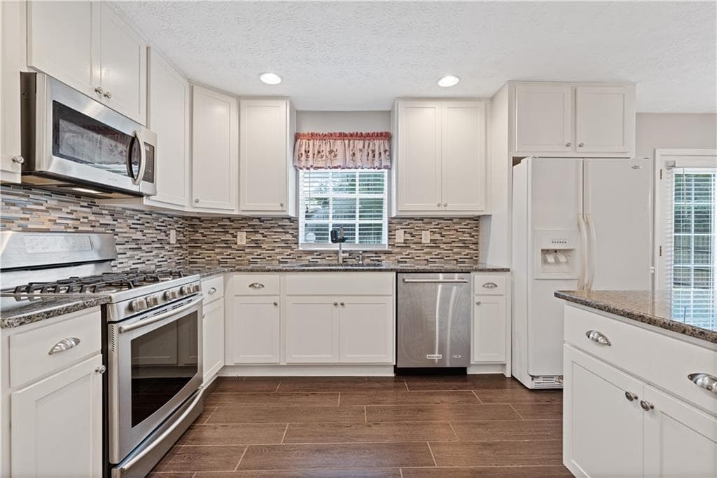 4 bedroom, 3 bathroom, 2,046 sq ft single family residence for rent at 3857 Peachtree Corners Circle, Peachtree Corners, GA 30092 for $2,395 a month — photo 3