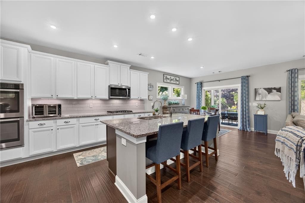 5 bedroom, 3 bathroom, 3,077 sq ft single family residence for sale at 138 Madison Street, Canton, GA 30115 — photo 9