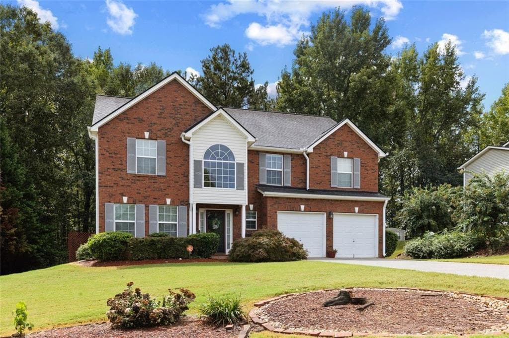 5 bedroom, 4 bathroom, 3,058 sq ft single family residence for sale at 1835 Winding Crossing Trail, Fairburn, GA 30213 — photo 2