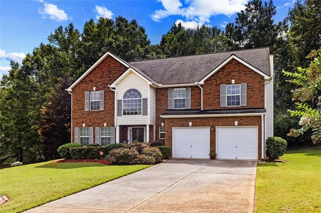 5 bedroom, 4 bathroom, 3,058 sq ft single family residence for sale at 1835 Winding Crossing Trail, Fairburn, GA 30213 — photo 3