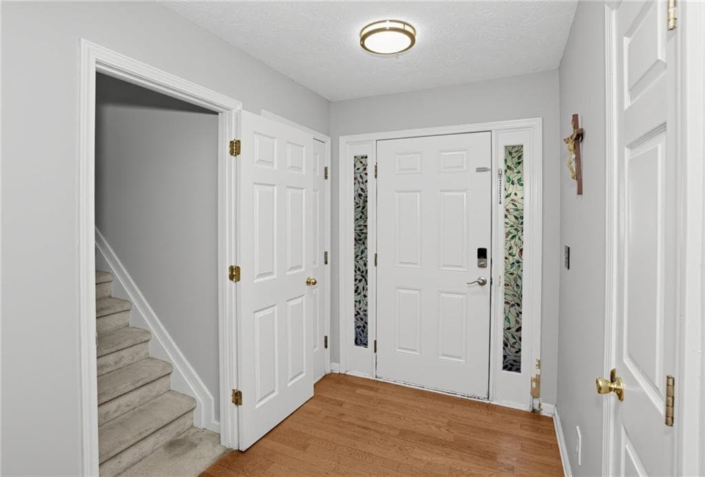 4 bedroom, 2 bathroom, 2,354 sq ft single family residence for sale at 5764 Dexters Mill Place, Buford, GA 30518 — photo 4