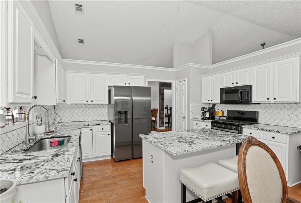 4 bedroom, 2 bathroom, 2,354 sq ft single family residence for sale at 5764 Dexters Mill Place, Buford, GA 30518 — photo 8
