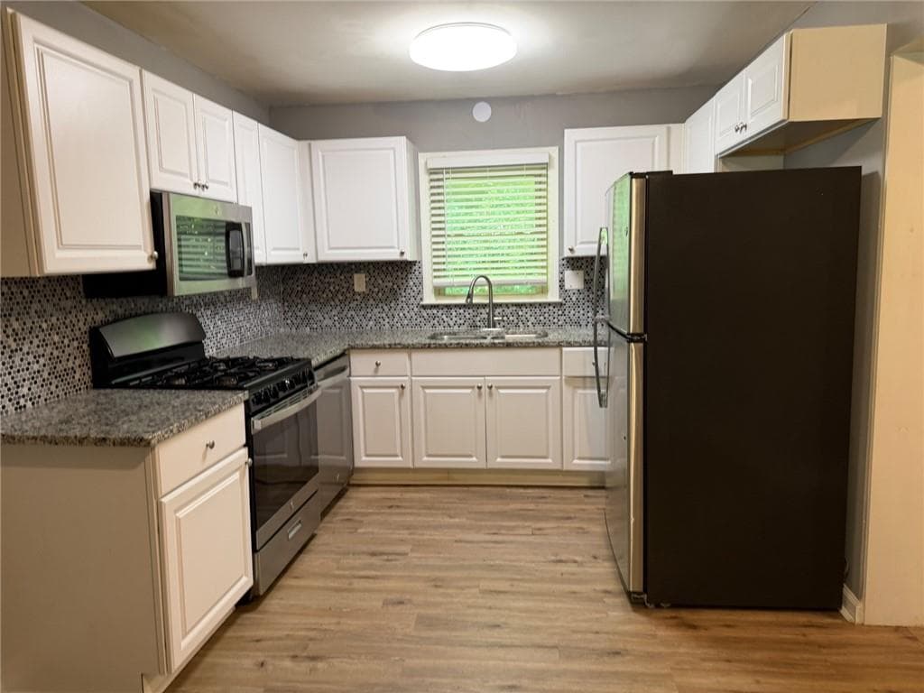4 bedroom, 2 bathroom, 1,680 sq ft single family residence for sale at 6352 N Sweetwater Road, Lithia Springs, GA 30122 — photo 7