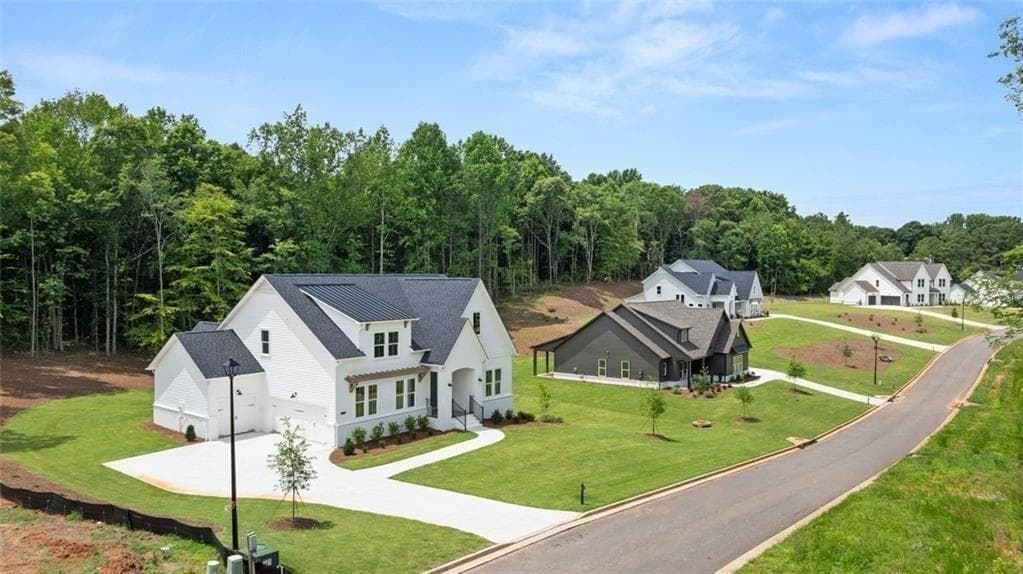 4 bedroom, 4 bathroom, 5,027 sq ft single family residence for sale at 8350 Creekside Overlook Drive, Gainesville, GA 30506 — photo 5