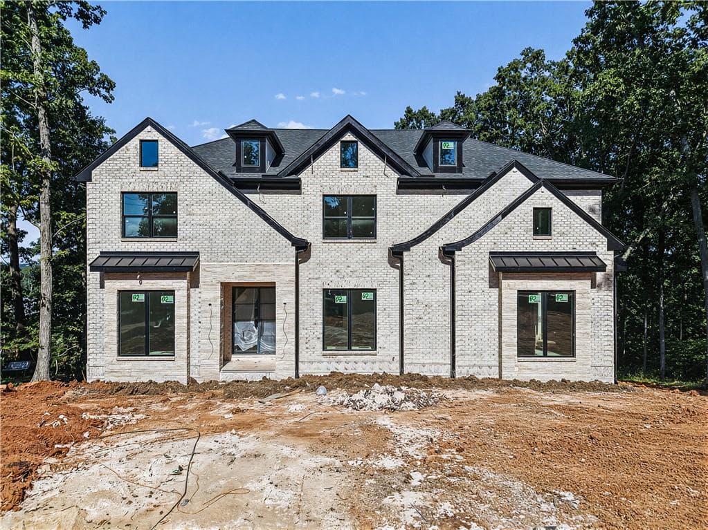 5 bedroom, 6 bathroom, 5,600 sq ft single family residence for sale at 1728 Plunketts Road, Buford, GA 30519