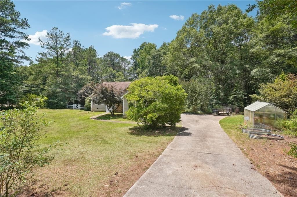 4 bedroom, 2 bathroom, 2,264 sq ft single family residence for sale at 115 Laney Court, Mcdonough, GA 30252 — photo 2