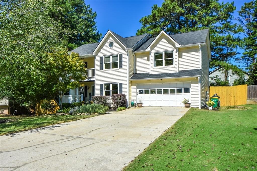 4 bedroom, 3 bathroom, 2,188 sq ft single family residence for sale at 970 Garner Spring Lane, Sugar Hill, GA 30518 — photo 2
