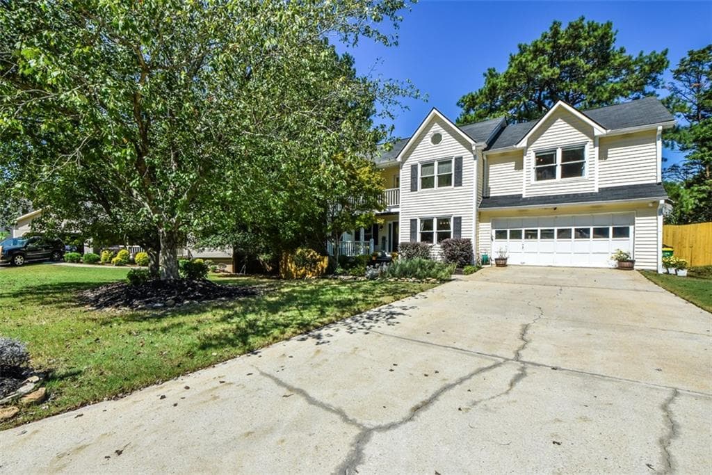 4 bedroom, 3 bathroom, 2,188 sq ft single family residence for sale at 970 Garner Spring Lane, Sugar Hill, GA 30518 — photo 3