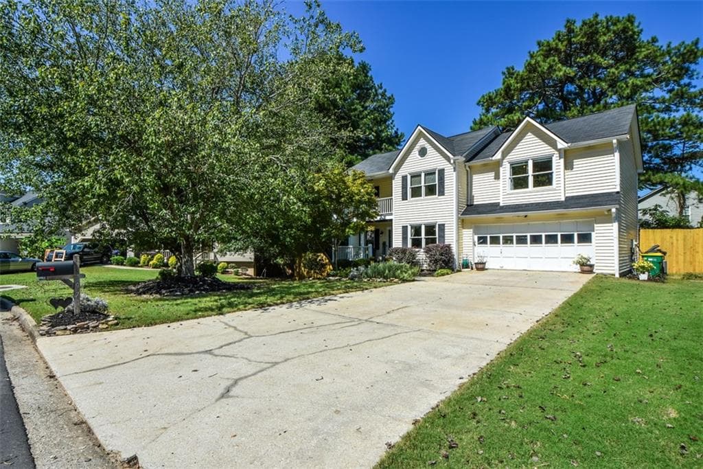 4 bedroom, 3 bathroom, 2,188 sq ft single family residence for sale at 970 Garner Spring Lane, Sugar Hill, GA 30518 — photo 4