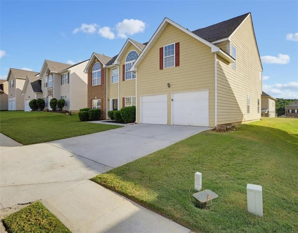 6 bedroom, 4 bathroom, 3,718 sq ft single family residence for sale at 4117 Eldon Drive, Fairburn, GA 30213 — photo 3