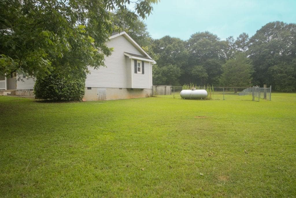 4 bedroom, 3 bathroom, 1,648 sq ft single family residence for sale at 162 Price Drive, Locust Grove, GA 30248 — photo 5