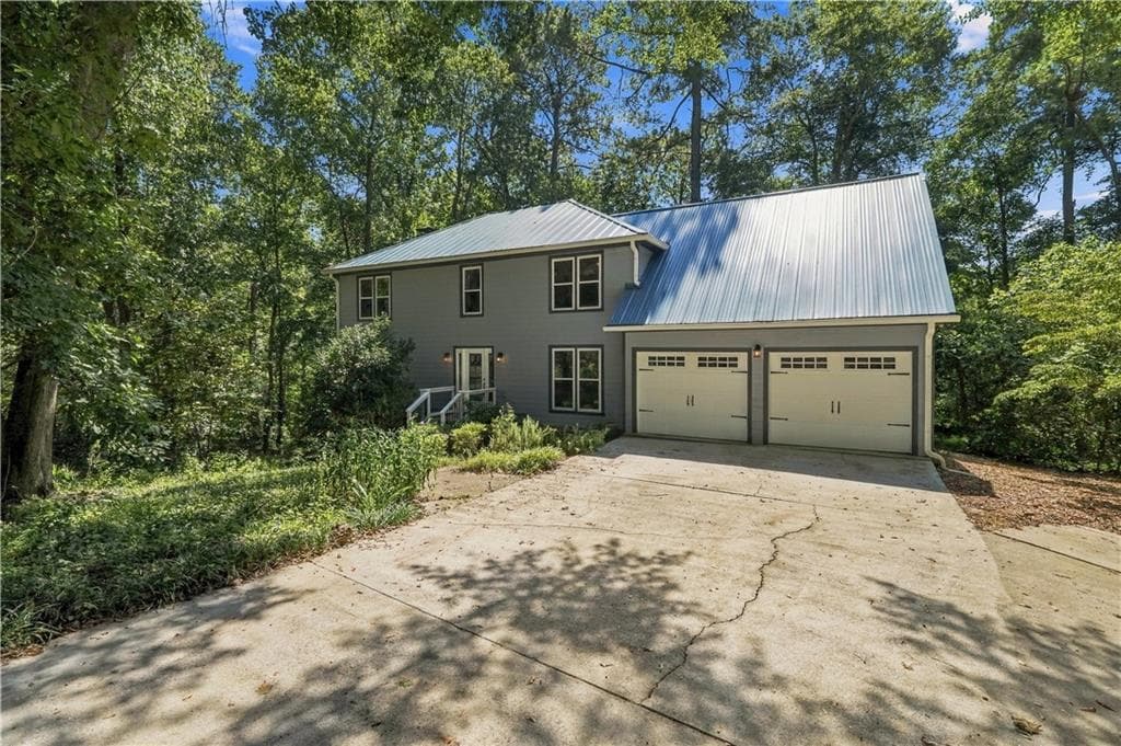 5 bedroom, 4 bathroom, 3,548 sq ft single family residence for sale at 4690 Nutmeg Way, Lilburn, GA 30047 — photo 2