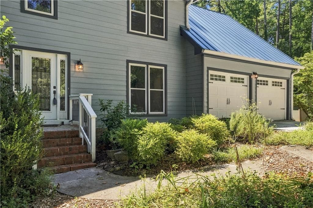 5 bedroom, 4 bathroom, 3,548 sq ft single family residence for sale at 4690 Nutmeg Way, Lilburn, GA 30047 — photo 3