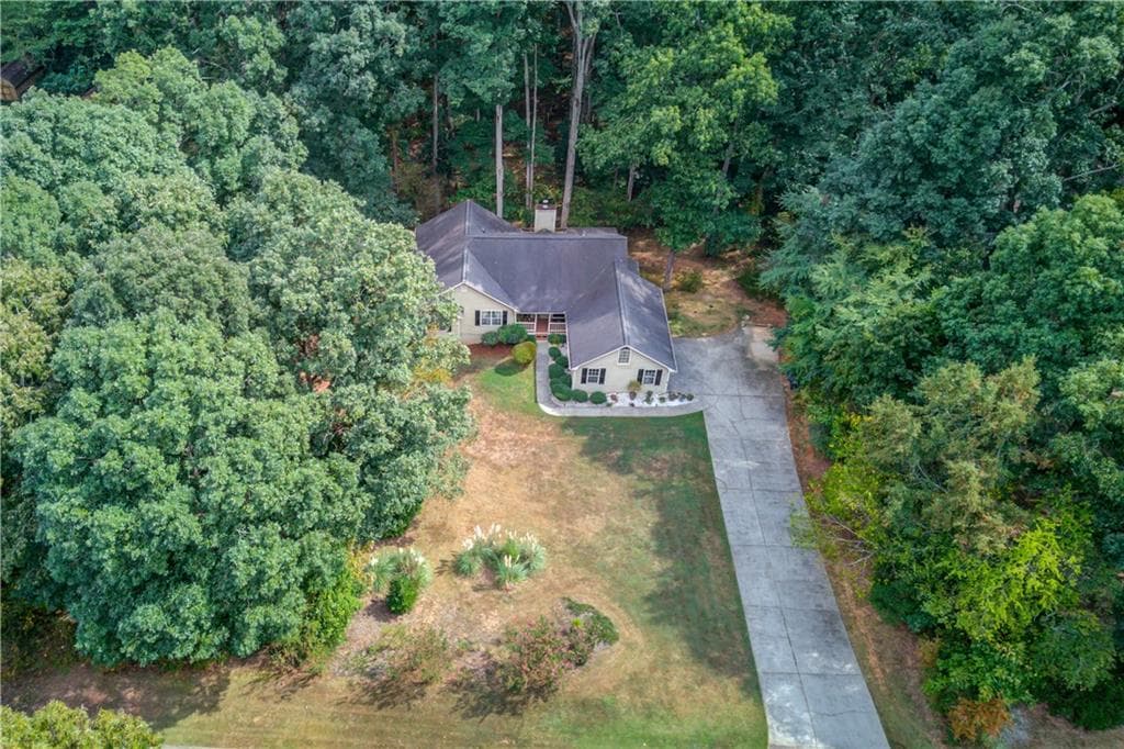 4 bedroom, 2 bathroom, 2,900 sq ft single family residence for sale at 3244 Holly Stand Court, Loganville, GA 30052 — photo 2