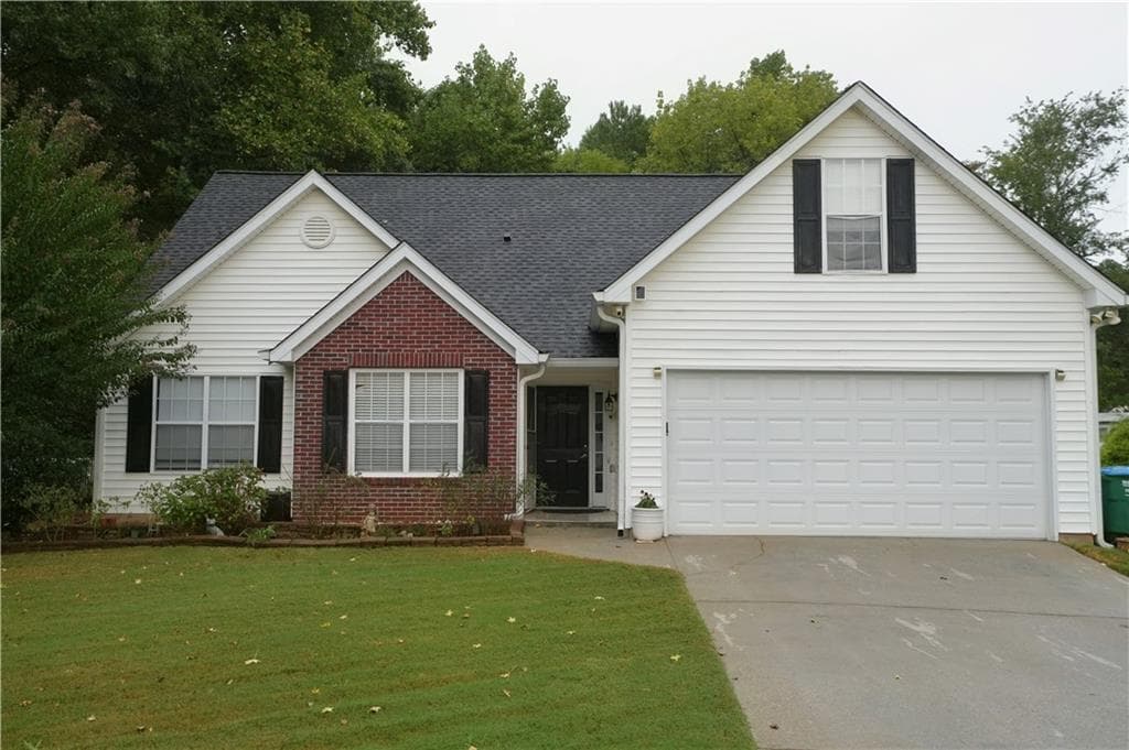 4 bedroom, 2 bathroom, 1,675 sq ft single family residence for sale at 2250 Boone Place, Snellville, GA 30078 — photo 2