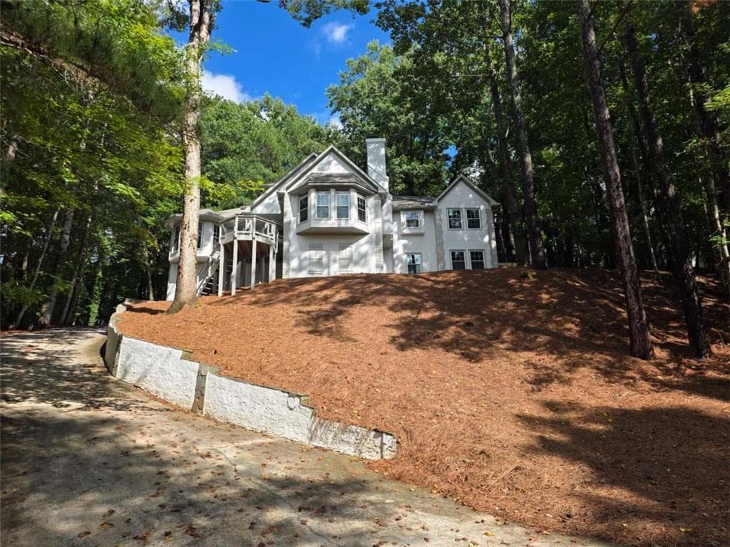 4 bedroom, 6 bathroom, 4,218 sq ft single family residence for sale at 8765 Mount Rushmore Drive, Johns Creek, GA 30022