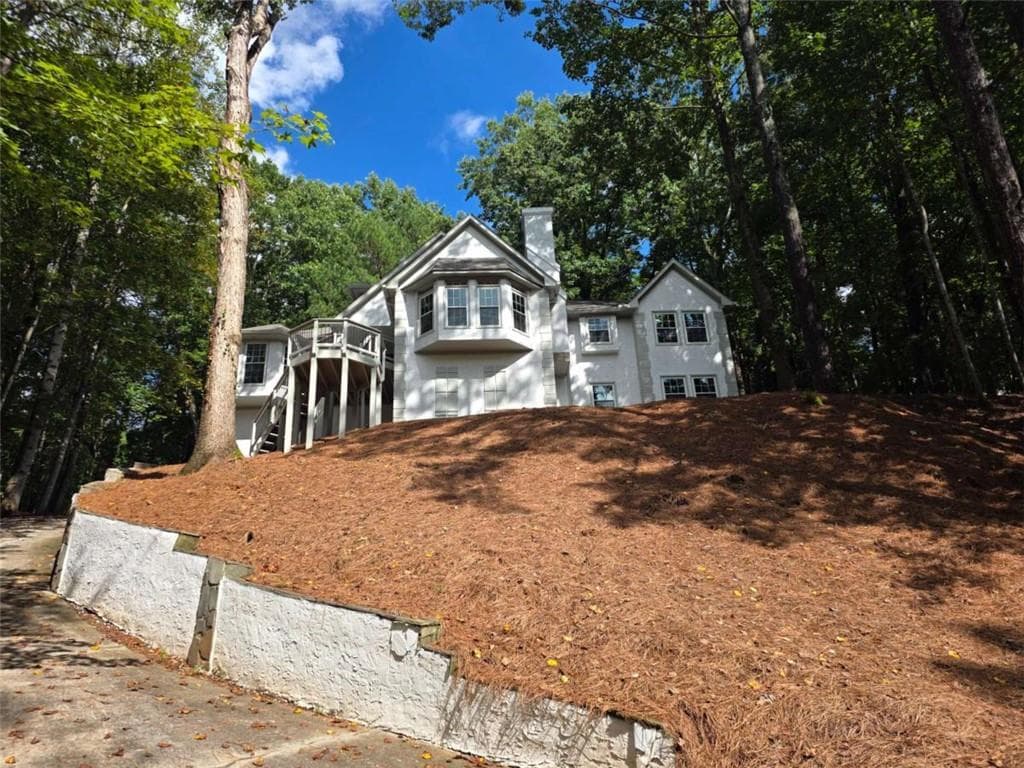 4 bedroom, 6 bathroom, 4,218 sq ft single family residence for sale at 8765 Mount Rushmore Drive, Johns Creek, GA 30022 — photo 2