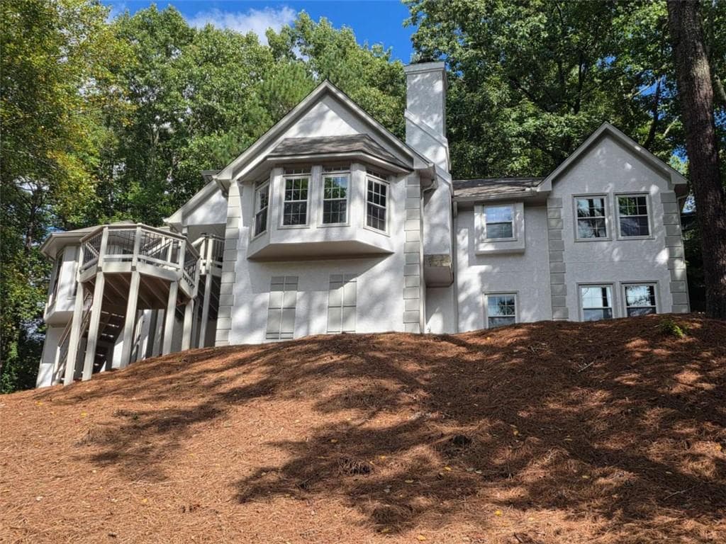 4 bedroom, 6 bathroom, 4,218 sq ft single family residence for sale at 8765 Mount Rushmore Drive, Johns Creek, GA 30022 — photo 3